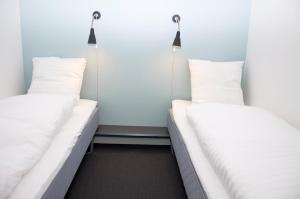 Postel nebo postele na pokoji v ubytování Motel X