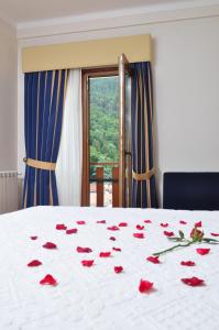 Postel nebo postele na pokoji v ubytování Moderna do Geres Hotel