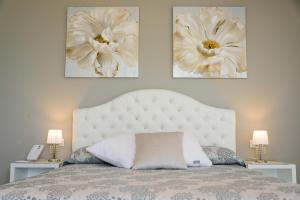 Cama ou camas em um quarto em Bellariva Monopoli B&B e Relax