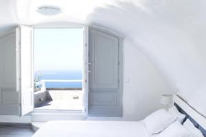 Voodi või voodid majutusasutuse Hotel Thireas toas