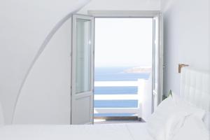 Voodi või voodid majutusasutuse Hotel Thireas toas