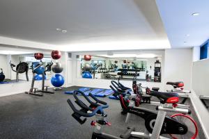 a gym with a bunch of bikes in a room at The Study at University City, Study Hotels in Philadelphia