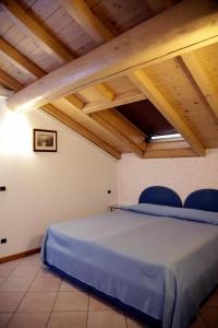 Postel nebo postele na pokoji v ubytování Residence Antico Crotto