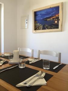 Restoran atau tempat lain untuk makan di Apartamentos DELFIN