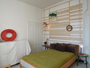Postelja oz. postelje v sobi nastanitve Charming house with private dock on Lake Como