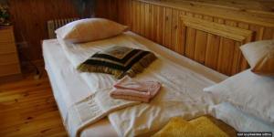 Postel nebo postele na pokoji v ubytování Eco Boutique Guest House Celmalas