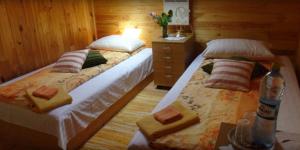 Postel nebo postele na pokoji v ubytování Eco Boutique Guest House Celmalas