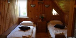 Postel nebo postele na pokoji v ubytování Eco Boutique Guest House Celmalas