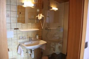 Kúpeľňa v ubytovaní Katharinahof Ferienpension + 37 fotografií