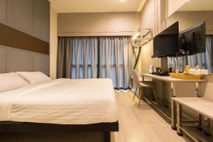 מיטה או מיטות בחדר ב-Lazy Sunday hostel