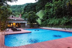 Bazén v ubytování Pousada de Coloane Boutique Hotel nebo v jeho okolí