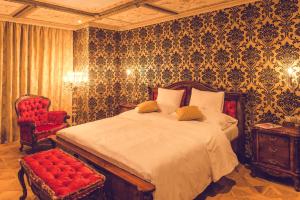 Uma cama ou camas num quarto em Hotel Florian Palace