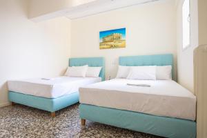 Posteľ alebo postele v izbe v ubytovaní Acropolis View Paradise Apartments