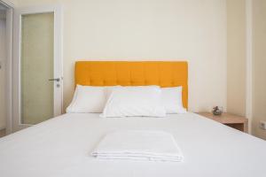 Posteľ alebo postele v izbe v ubytovaní Acropolis View Paradise Apartments