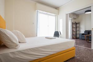 Posteľ alebo postele v izbe v ubytovaní Acropolis View Paradise Apartments