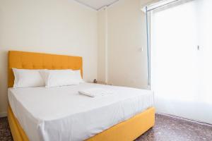 Posteľ alebo postele v izbe v ubytovaní Acropolis View Paradise Apartments