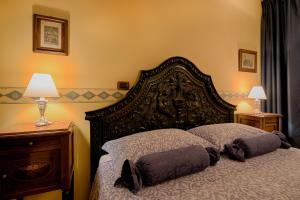 Postel nebo postele na pokoji v ubytování B&B Contrada dei Giardini