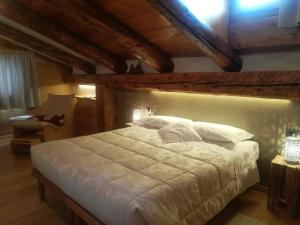 Llit o llits en una habitació de Albergo Pa' Krhaizar