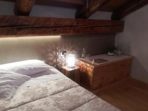 Llit o llits en una habitació de Albergo Pa' Krhaizar