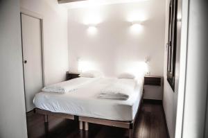 Postel nebo postele na pokoji v ubytování Barcelona Beach Apartments
