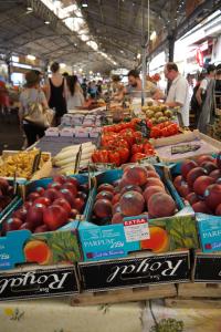 a market with many boxes of fruits and vegetables at Vieille Ville 2 - La Petite Maison à Safranier, 2 bedrooms, max 4 adults and 2 kids in Antibes