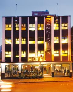 a hotel building with a sign on the front of it at Bannister Hotel in Johannesburg