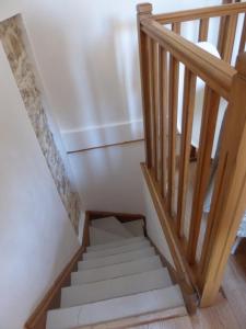 a stair case with a box in the middle at Vieille Ville 2 - La Petite Maison à Safranier, 2 bedrooms, max 4 adults and 2 kids in Antibes