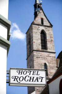 En logo, et sertifikat eller et firmaskilt på Central City Hotel Rochat