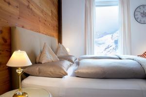 Hotel Bergwelt 객실 침대
