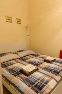 מיטה או מיטות בחדר ב-Walkway Apartment Deluxe