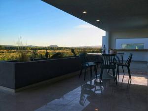 Balkón nebo terasa v ubytování Barrancas Suites