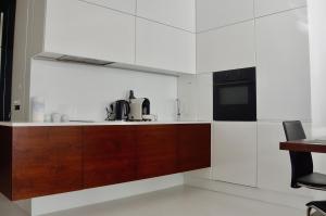 Kuchyň nebo kuchyňský kout v ubytování Apartament Wzgórze Słowików