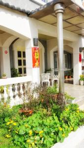 Een tuin van Red Roof B&B