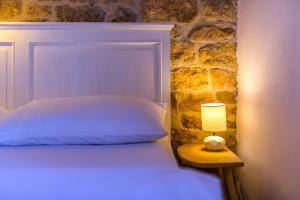 Katil atau katil-katil dalam bilik di Rural house Mudrinic "Ivini dvori"