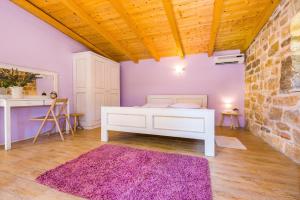 Posteľ alebo postele v izbe v ubytovaní Rural house Mudrinic "Ivini dvori"