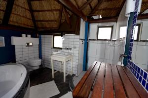 Koupelna v ubytování Inyameko BnB