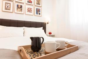 A bed or beds in a room at Old Town, City Center Apartment Premium with PARKING