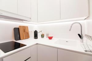 A kitchen or kitchenette at Old Town, City Center Apartment Premium with PARKING