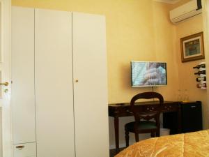 TV a/nebo společenská místnost v ubytování I 13 Cavalieri Guest House
