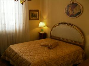 Postel nebo postele na pokoji v ubytování I 13 Cavalieri Guest House