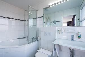 Koupelna v ubytování BioHotel Kassel Wilhelmshöher Tor + 16 fotografií