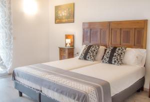 Кровать или кровати в номере Agriturismo Monte Oliveto