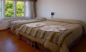 Postel nebo postele na pokoji v ubytování Monte Cervino Hotel