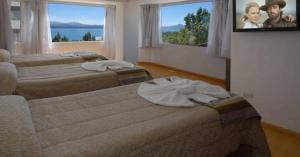 Säng eller sängar i ett rum på Monte Cervino Hotel