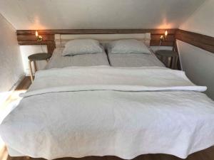 Postel nebo postele na pokoji v ubytování Ranch Mörby