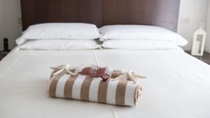 Postel nebo postele na pokoji v ubytování Hotel Cristina Corona