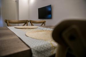 TV o dispositivi per l'intrattenimento presso Miklù Luxury Suite