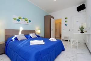 Postel nebo postele na pokoji v ubytování I Pini di Roma - Rooms & Suites