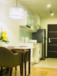 Kuchyň nebo kuchyňský kout v ubytování Astra Suites Central