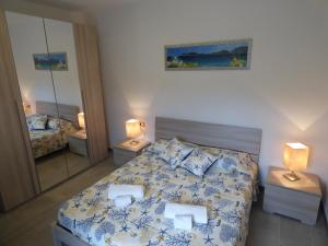 Ένα ή περισσότερα κρεβάτια σε δωμάτιο στο B&B Fiori di Pesco